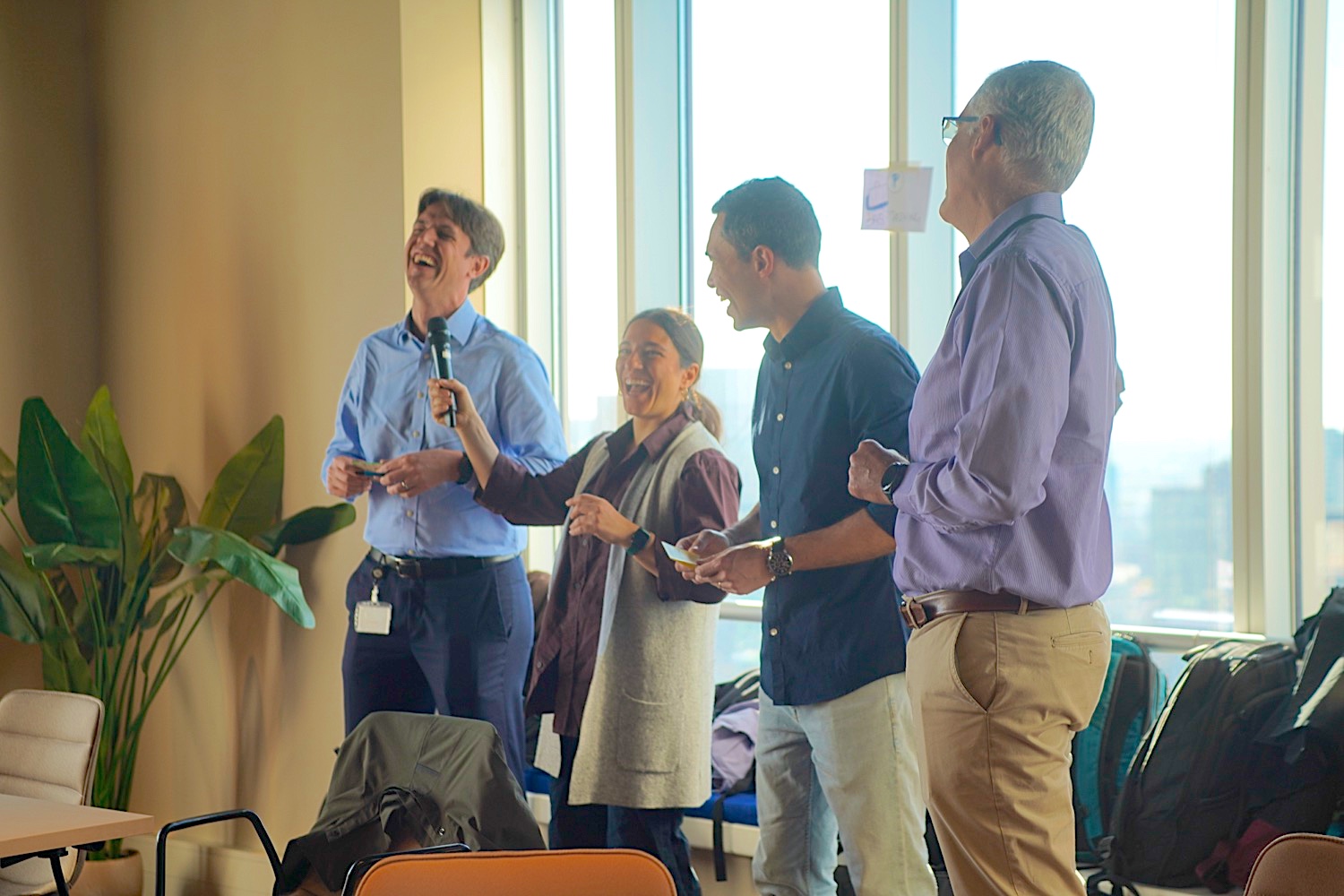 A large group in a facilitated session